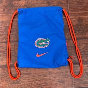 Nike Blue Drawstring Backpack with Orange Accents and Florida Gator Logo